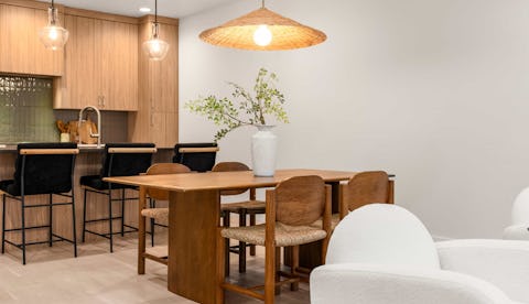 Victoria Commons dining table with overhead light.